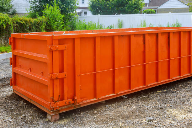construction trash garbage dumpsters on metal container house renovation.